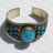 Bracelet tibétain en métal argenté et perles couleur turquoise